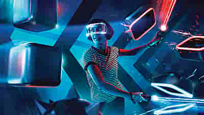 Adults enjoying VR games together