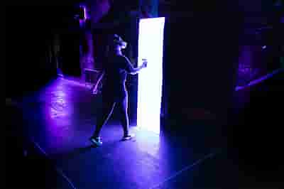A person walking into a portal in virtual reality