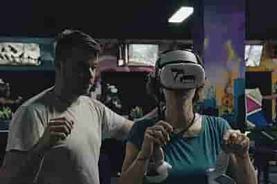 A group working together during a VR activity at VRcafe Haarlem