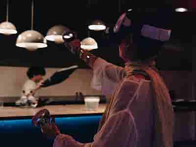 People trying VR headsets at an event location