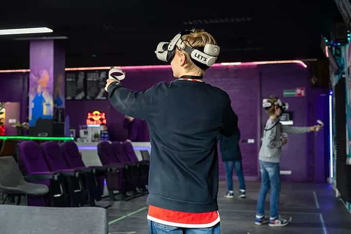 Children experiencing virtual reality with VR headsets