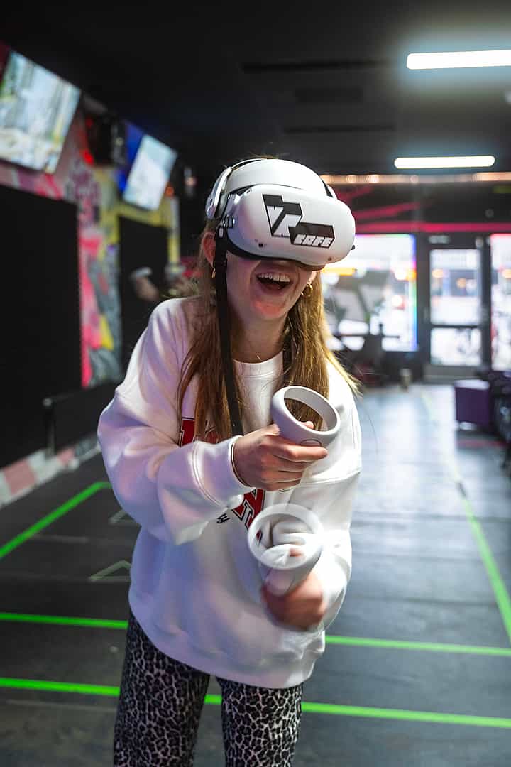 Children celebrating a birthday party while playing VR games at VRcafe Haarlem
