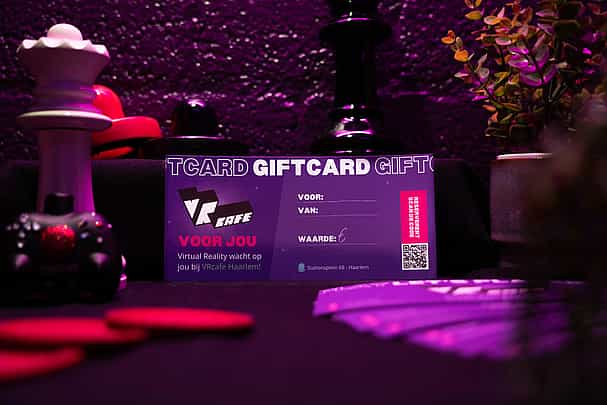 VRcafe Haarlem giftcard standing against a purple wall with chess figures and plants around it